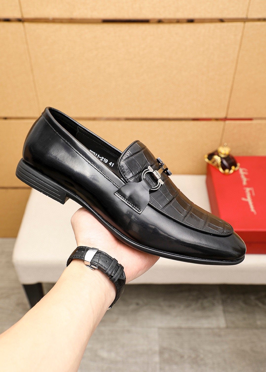 Ferragamo Black Embossed Buckle Loafers — model