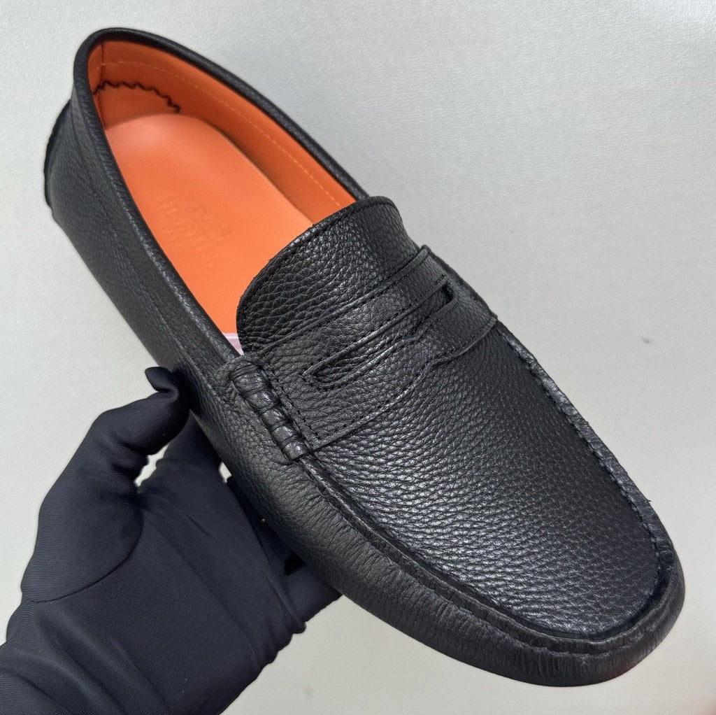 Hermès Black Textured Penny Loafers — hero