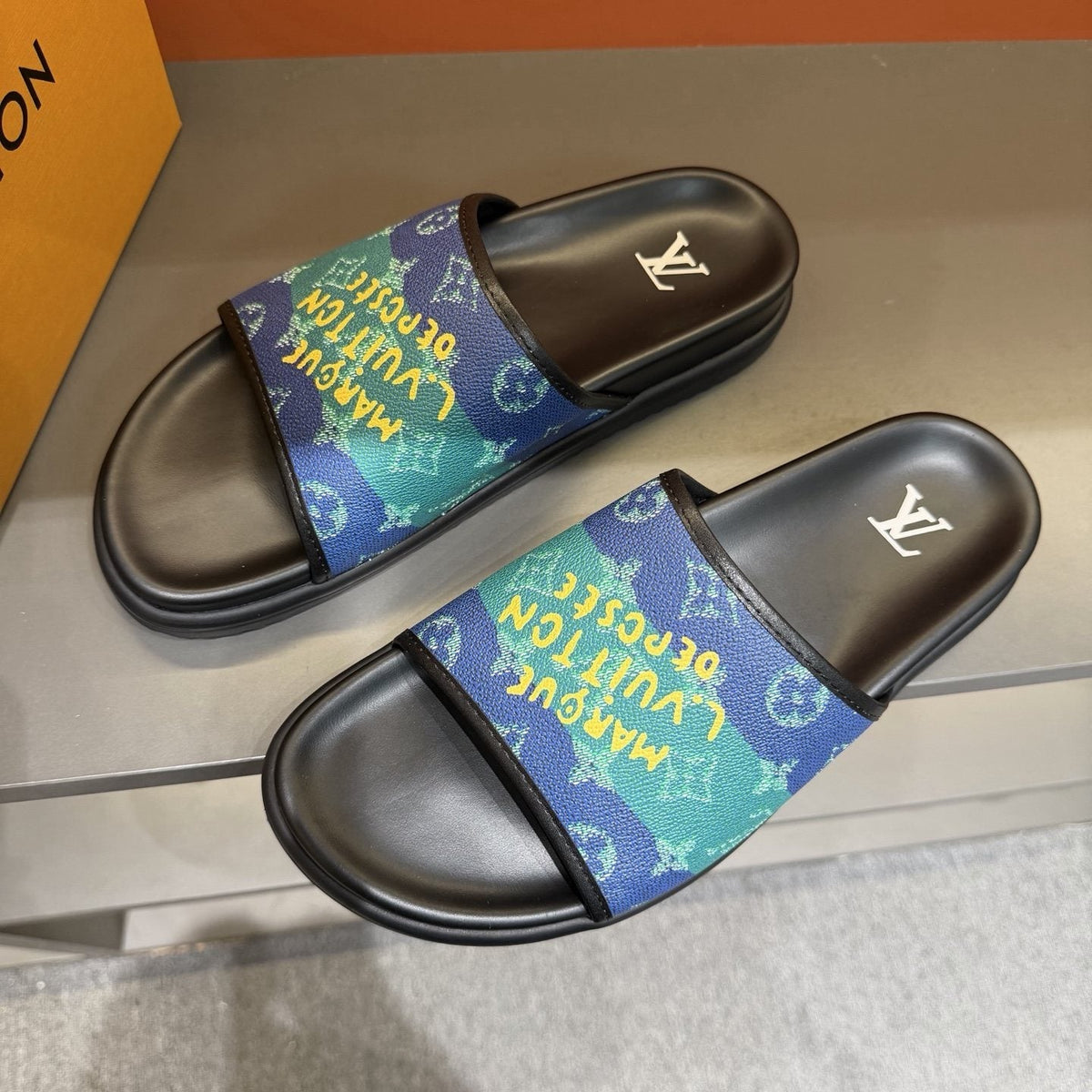Louis Vuitton Blue Green Patterned Slide Sandals — front