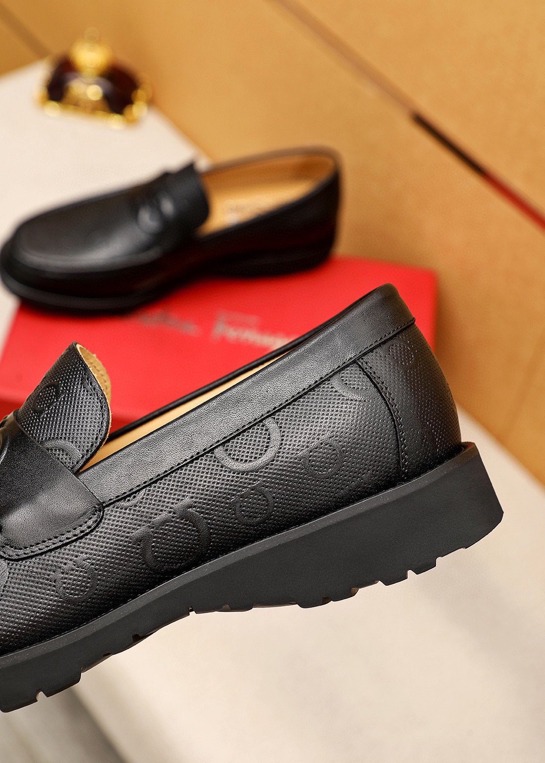 Ferragamo Black Embossed Slip-On Shoes — detail