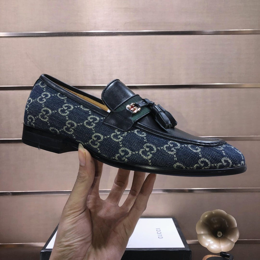 Gucci Monogram Tassel Loafers — model