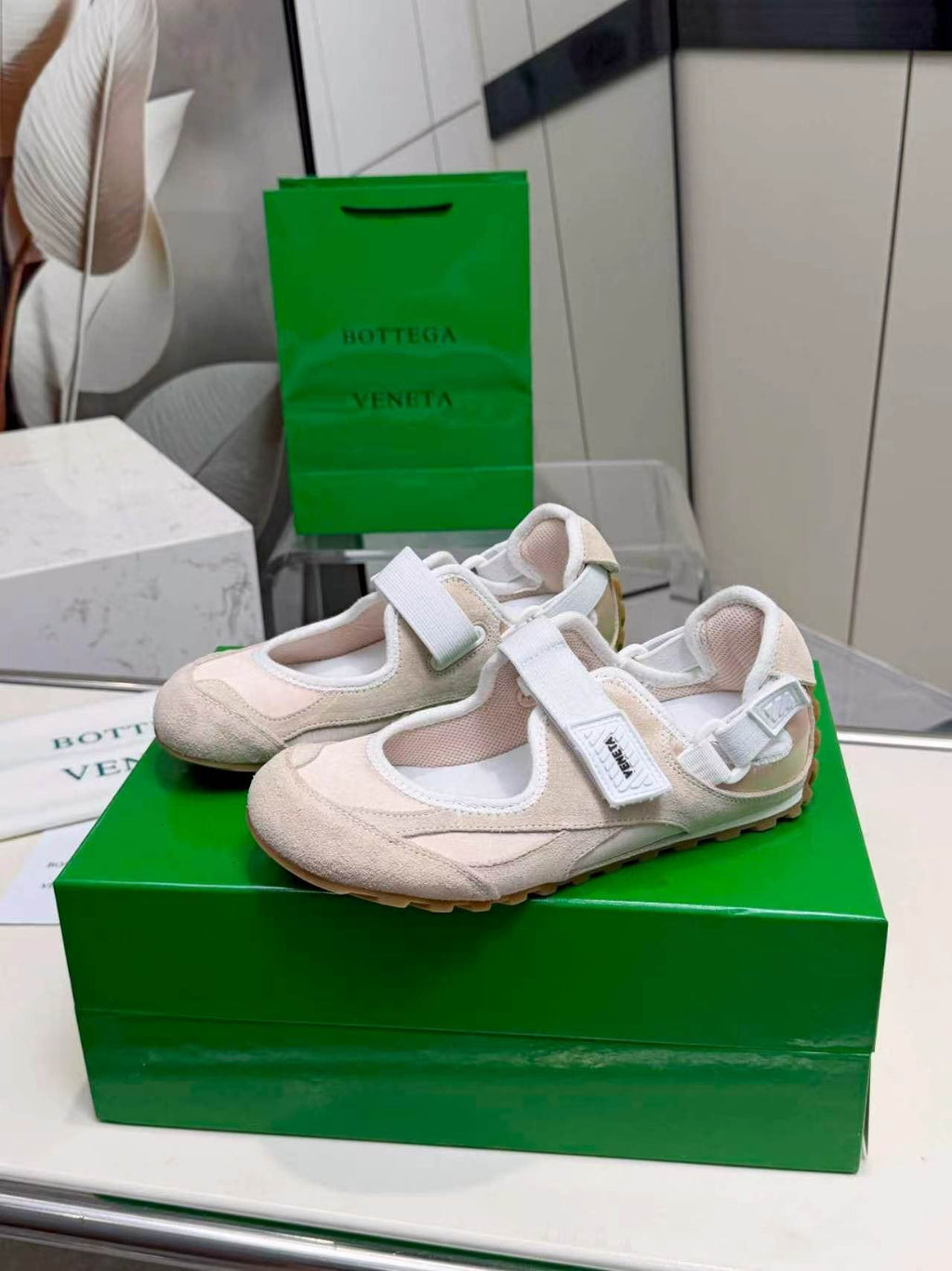 Bottega Veneta Buckled Strap Low-Top Sneakers — side
