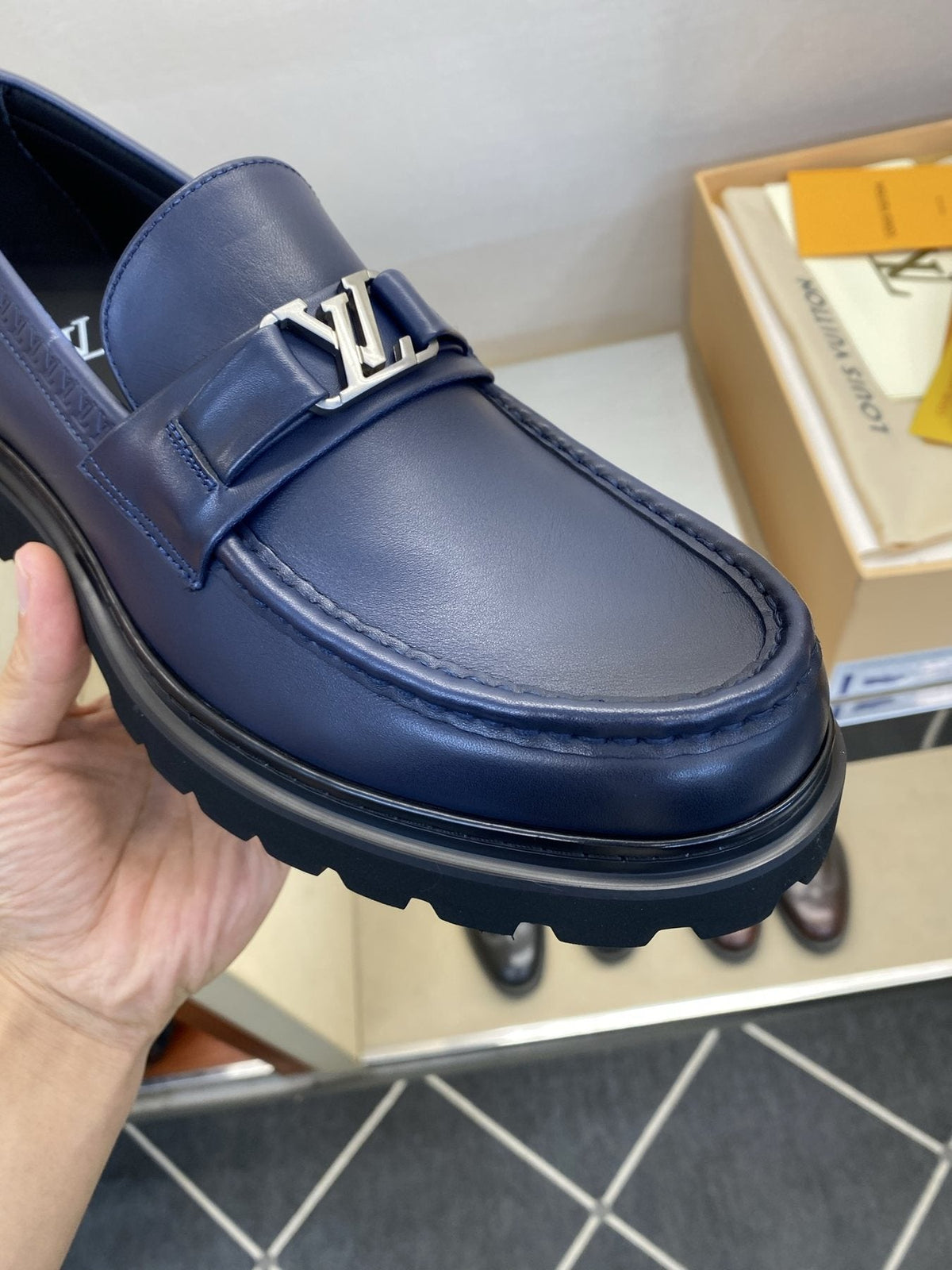 Louis Vuitton Metal Logo Loafers — detail